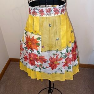 Vintage 1940’s/50’s yellow Christmas half apron with poinsettia & ornament print
